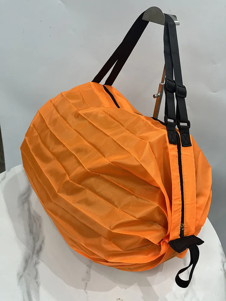 Portable recyclable folding shopping bag