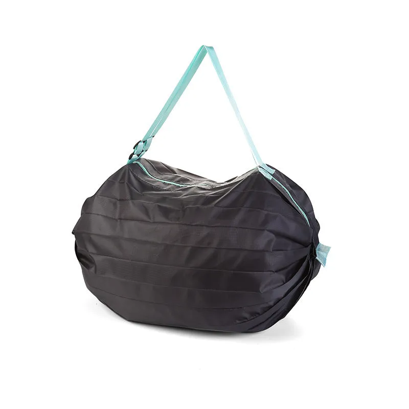 Portable recyclable folding shopping bag