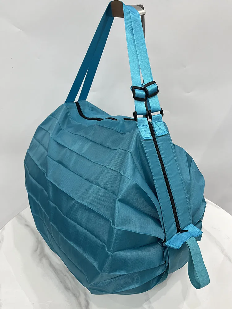 Portable recyclable folding shopping bag